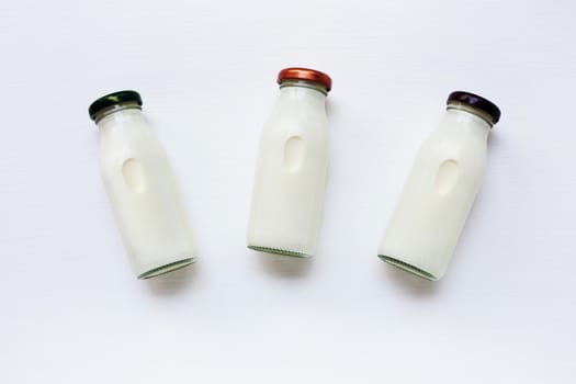 milk bottle on white background. Top view