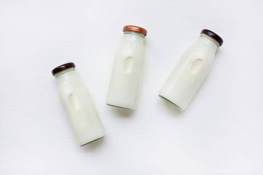milk bottle on white background. Top view