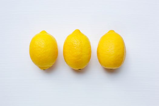 Fresh lemon on a white background. Top view