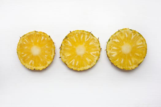 Slices of pineapple  isolated on white background.