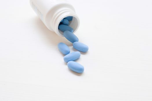 A bottle of "PrEP" ( Pre-Exposure Prophylaxis). used to prevent HIV, on white background.