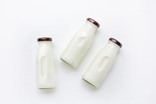 milk bottle on white background. Top view