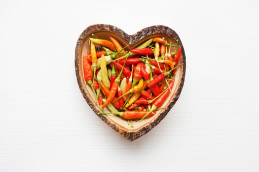 Chili peppers on white.