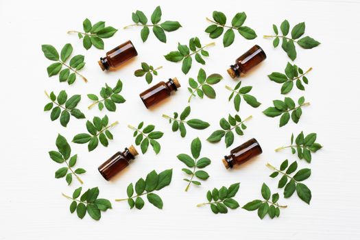 Bottles of essential rose oil for aromatherapy, Huntington Rose leaf.