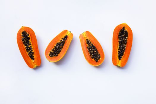 Papaya on white background. Copy space