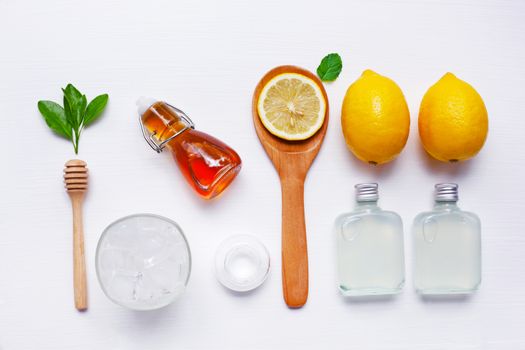 Lemon juice, Lemonade with fresh lemon, honey, ice, mint and salt . Healthy ingredient. on white