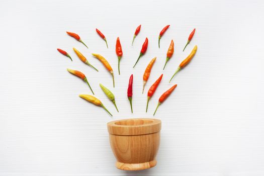 Chili peppers on white.