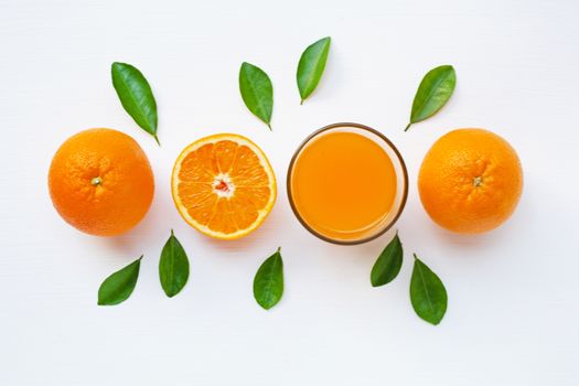 Fresh orange citrus fruit with leaves isolated on white background.