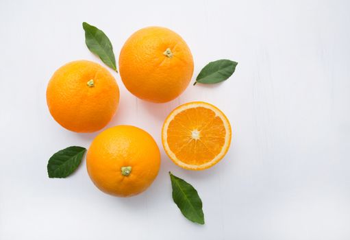 Fresh orange citrus fruit on white background. Top view