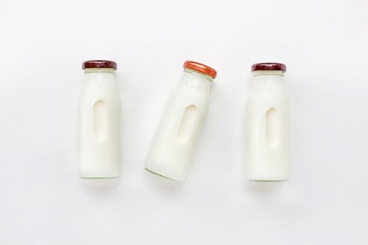 milk bottle on white background. Top view