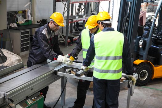 CNC machine shop with lathes, technicians and workers
