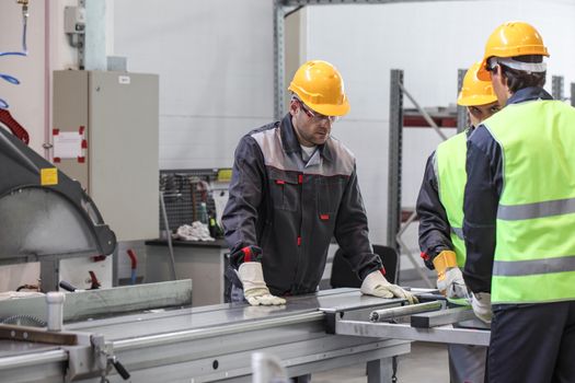 CNC machine shop with lathes, technicians and workers