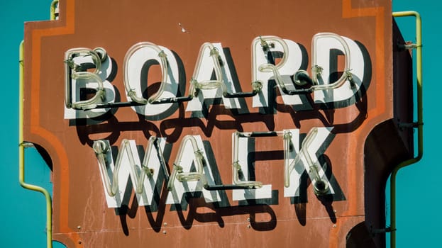 A Retro Vintage Rustic Neon Boardwalk Sign In California