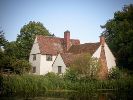 vintage impression of willy lotts' cottage on a summer's day in constable country; Suffolk; England; UK