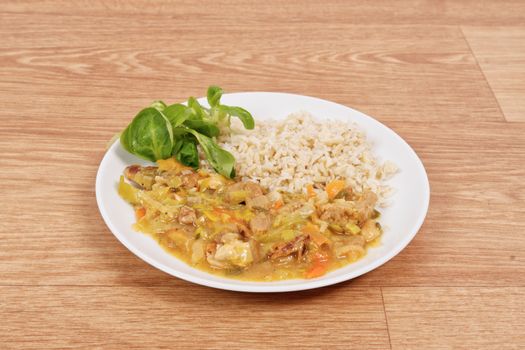 China of soy noodles and leek with rice on a white background