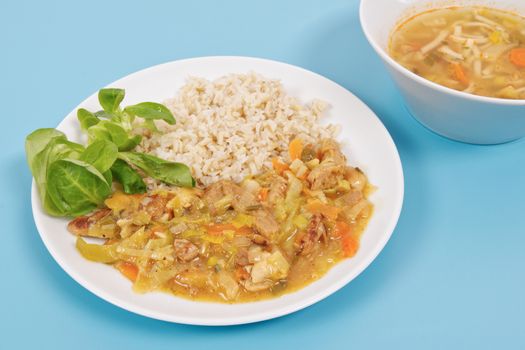 China of soy noodles and leek with rice on a white background