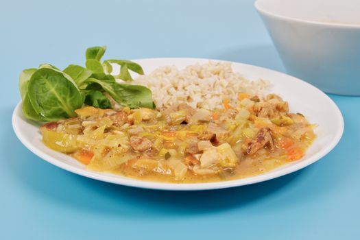 China of soy noodles and leek with rice on a white background