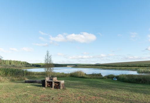 A barbeque area at the dam at Tortoni near Maclear in the Eastern Cape Province. A canoe is visible