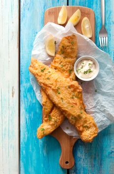 Two pieces of cod fried in batter