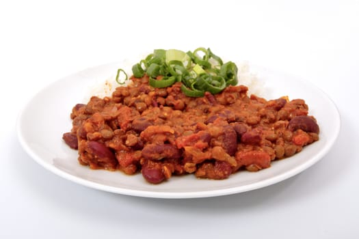 Indian legume hash with rice on a white background