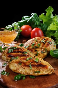 tender, juicy chicken breast grilled with vegetables ingredients and dressing 