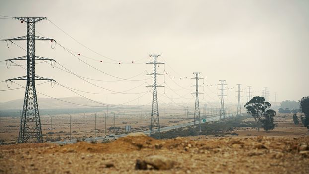 industrial landscape, electric poles in the desert