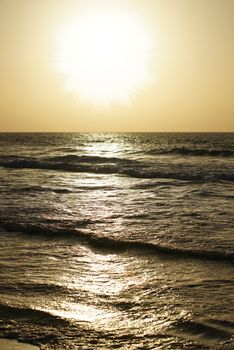 natural sea landscape waves on a sunset background