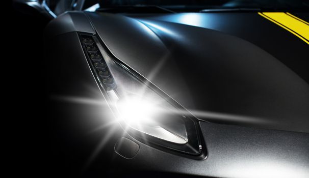 machine industry, sports car headlight close-up