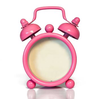 Miniatue Antique Pink Alarm Clock without Number. Real Shadow. Vintage White Texture. Beautiful Pastel Color. Isolated with real shadow reflected on white.