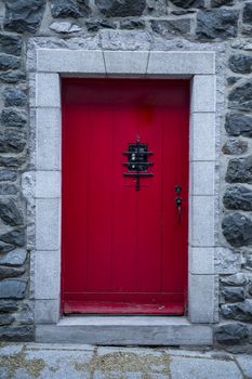 Wooden door entrance in the historical district in Quebec City, Canada