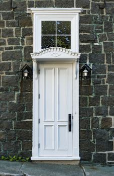 Wooden door entrance in the historical district in Quebec City, Canada