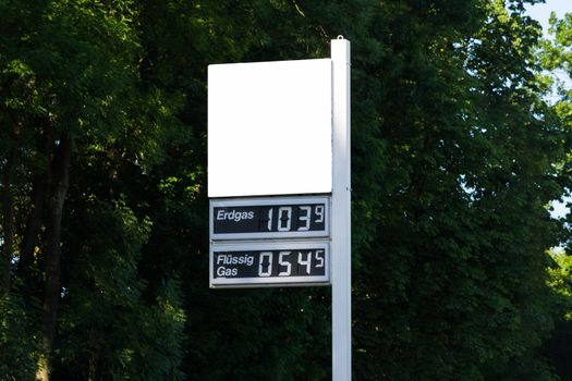 Blackboard at a German gas station with current gas price for LPG and natural gas.