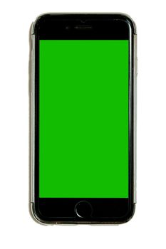 Smart phone in protective case with green chroma key touchscreen, isolated on white background, cell, mobile phone, adaptable for mockups and design, large resolution