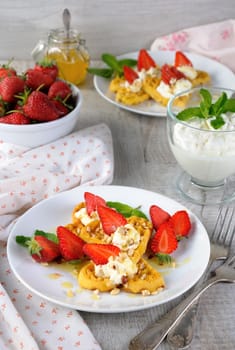  Delicate, melting  mouth-watering  Belgian waffles with whipped cream, strawberries, flavored with peanuts and honey. What could be better for breakfast.
