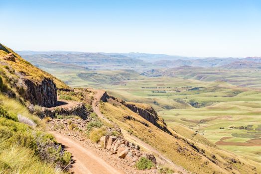 An aerial view of the Naudes Nek Pass in the Eastern Cape Province of South Africa. Cattle, a person and a vehicle are visible