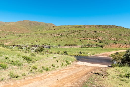 A farm landscape at the bottom of the Naudes Nek Pass near Rhodes in the Eastern Cape Province of South Africa
