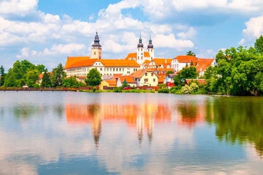 Panoramic view of Telc Castle. Water reflection, Czech Republic. UNESCO World Heritage Site..