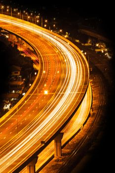 Street night light, light trails at night on the road