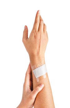 Adhesive bandage with transparent waterproof on hand woman. Isolated on white background, Saved clipping path.