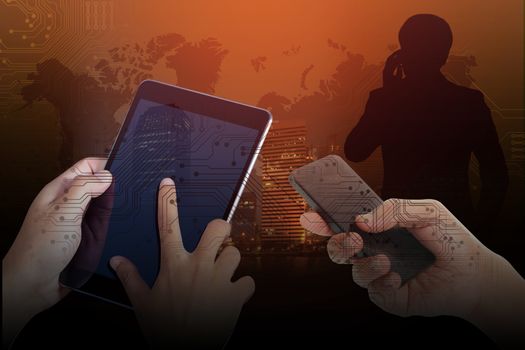 Double exposure of Technology concept, Successful Businessman using a cell phone and a digital tablet in a Abstract Technology Backgrounds