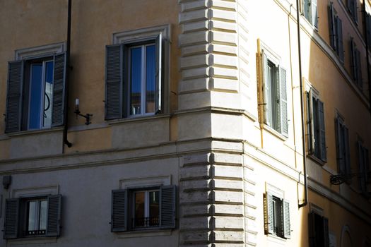 old buildings in Rome with contrast between lights and shadows