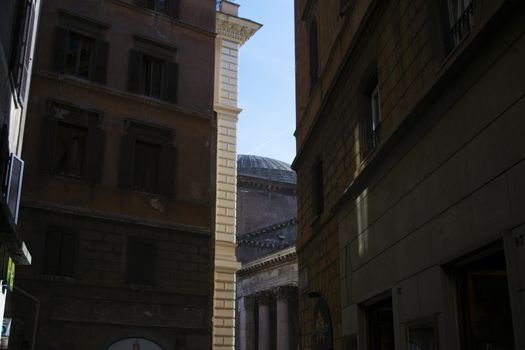 view of the Pantheon through the old buildings on the Rome centre