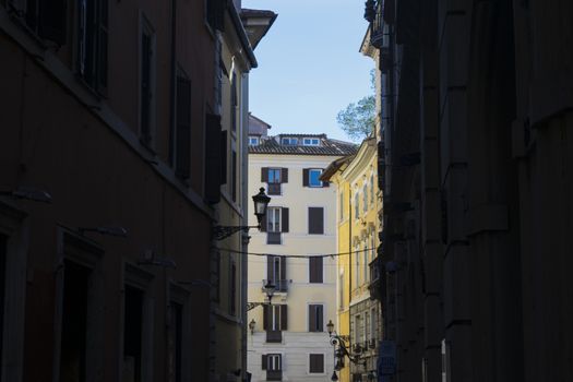 an alley in the historical centre of Rome with its old buildings