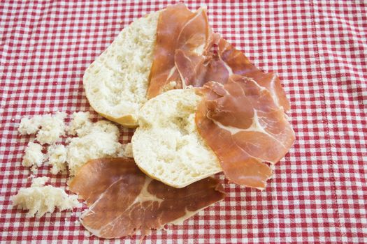 making smoked ham sandwich using a bread roll called rosetta