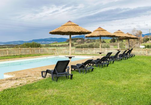 swimming pool with mountains as background