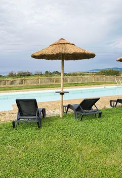 swimming pool with mountains as background