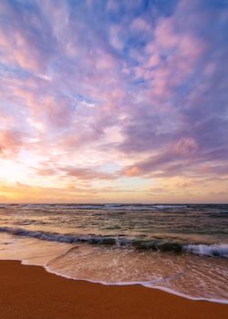A dramatic sunset looking over the Pacific Ocean. Kauai, Hawaii.