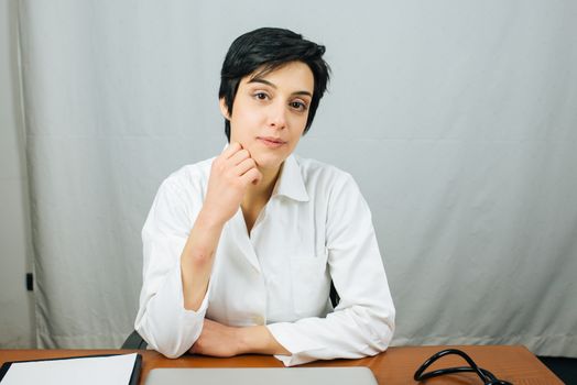 Medical doctor woman in the office.