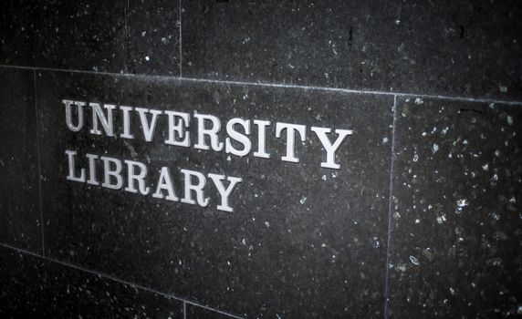 A Sign For The Library At A Prestigious University On Marble