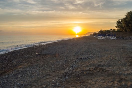 Sunrise on the beach of Campofelice di Roccella in northern Sicily in Italy